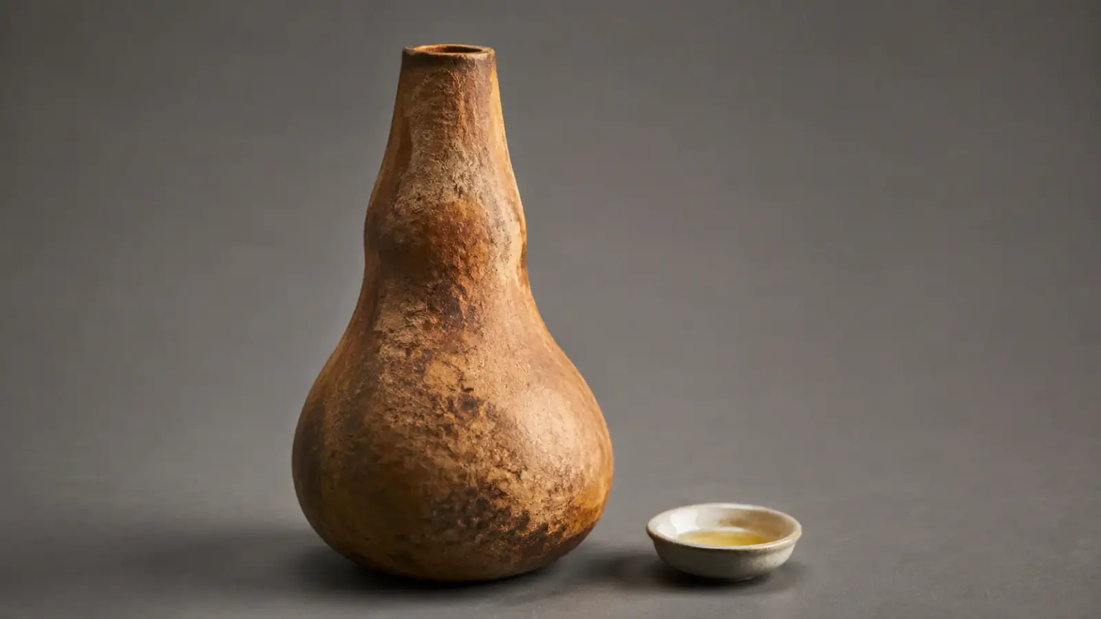 Recipiente de calabaza a escala con etiqueta de uso catalogado para aceite o grasa
